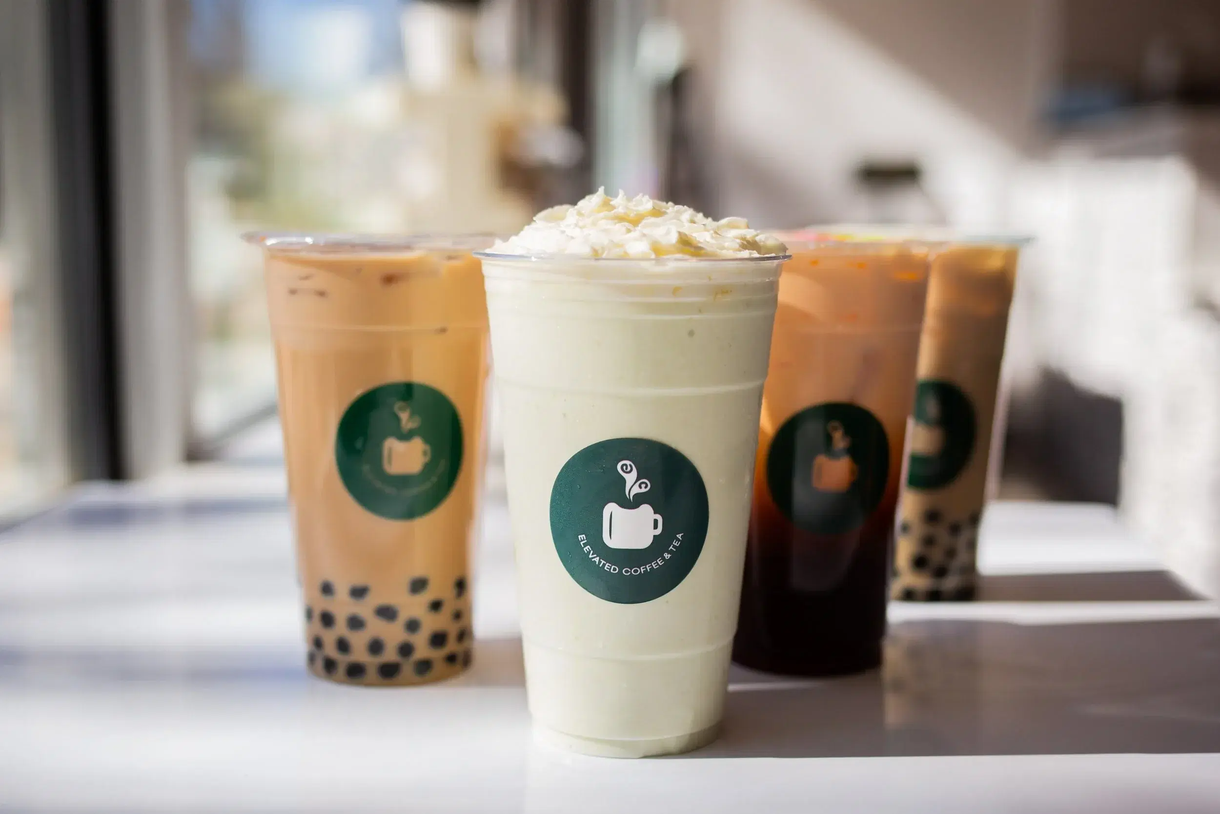A lineup of four Elevated drinks